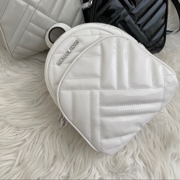 Michael Kors Handbags - Michael Kors abbey xs Minnie backpack Crossbody bag